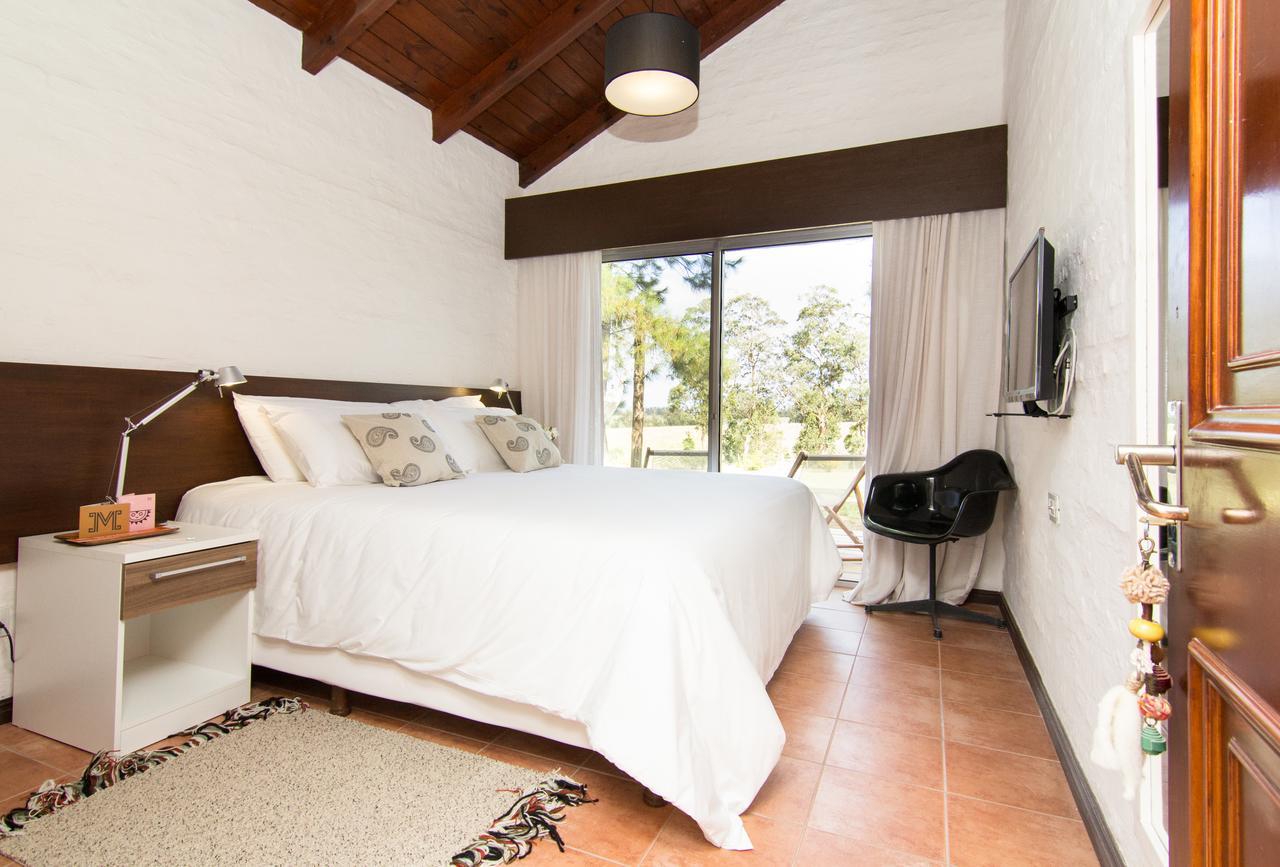 Posada Mosaico Villas Garzon Zimmer foto